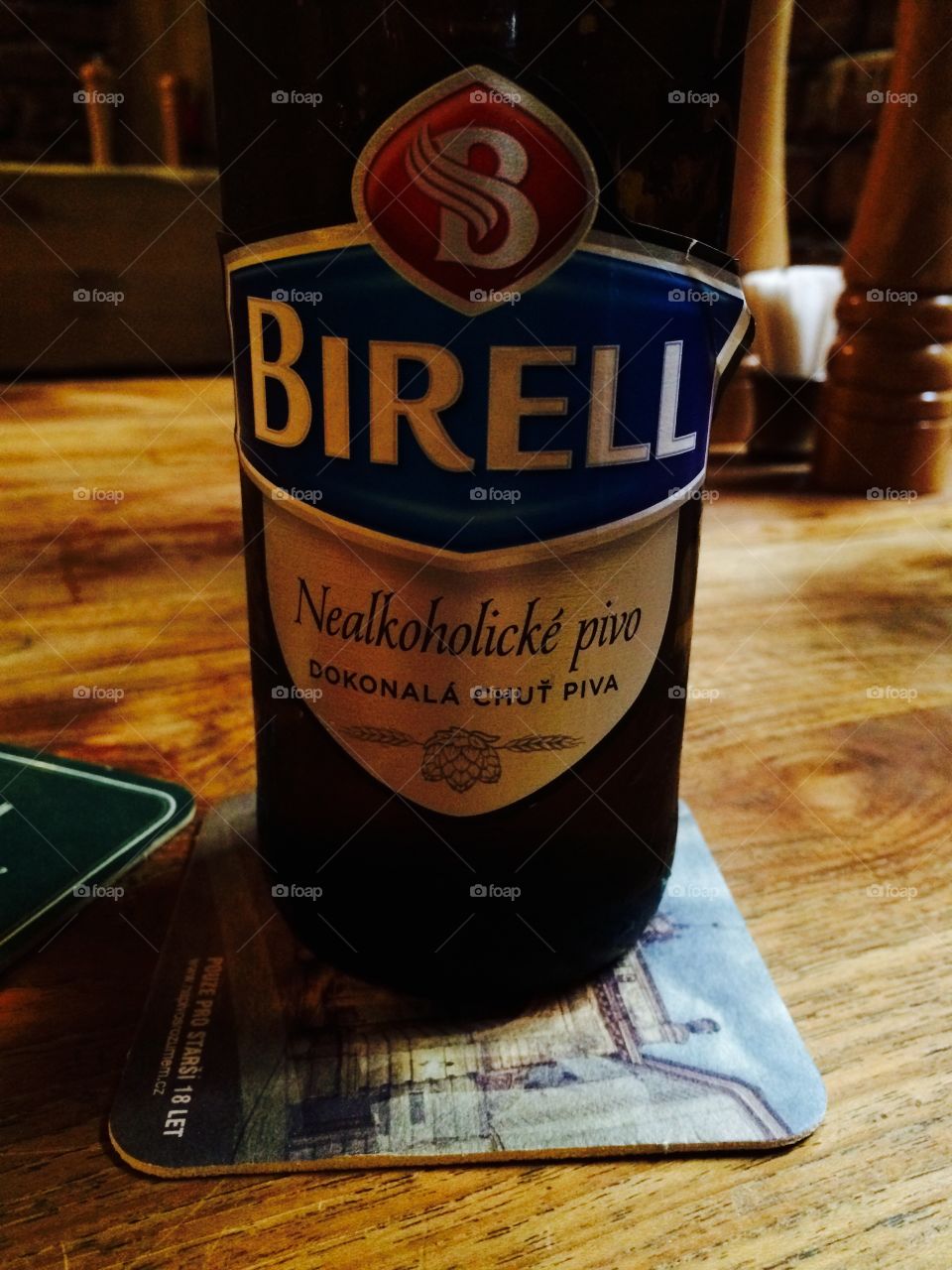Close up of Birell beer label in Prague restaurant 