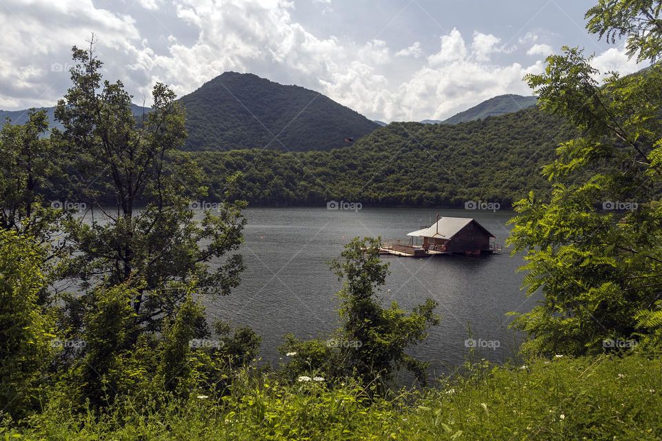 Pontoons house in Vacha Dam surrounded by Rodopes Mountain