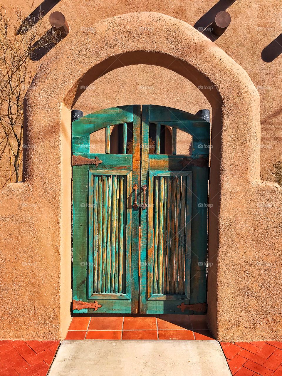 Southwest door green vibrant summer adobe Mexico noon contrast western old authentic texture tactile balanced symmetrical spicy welcoming 