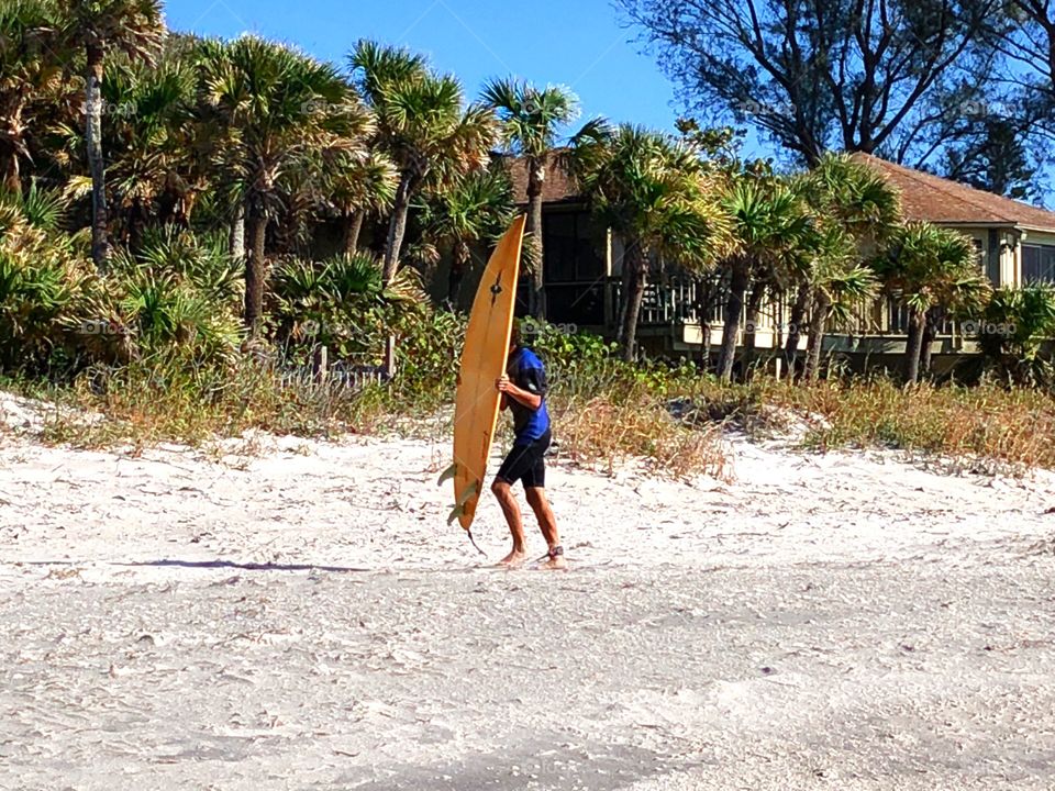 Surfer on the beach.