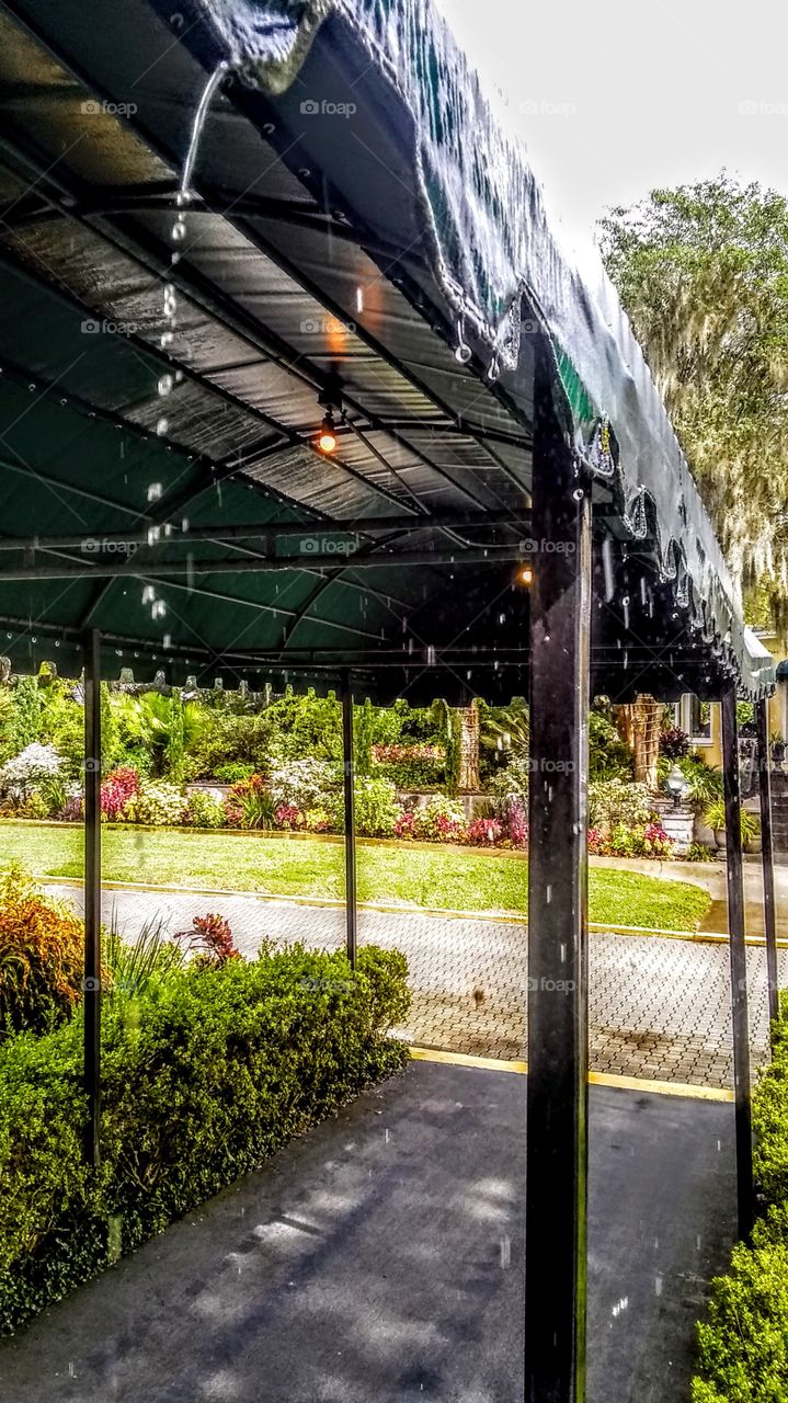 raindrops under awning after Florida rain
