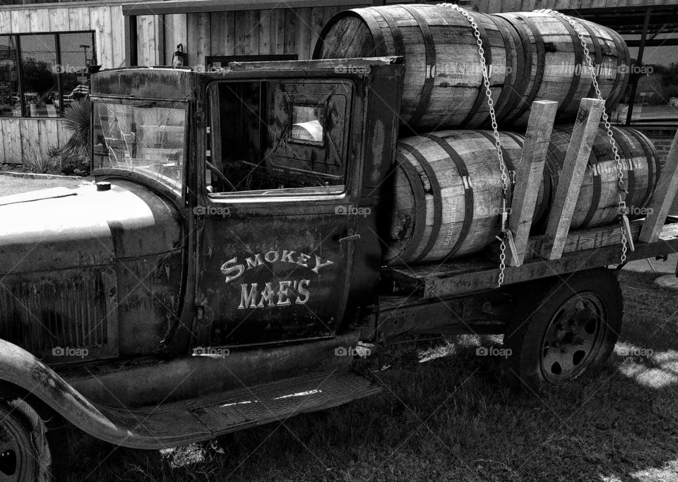 Old truck and whiskey barrels