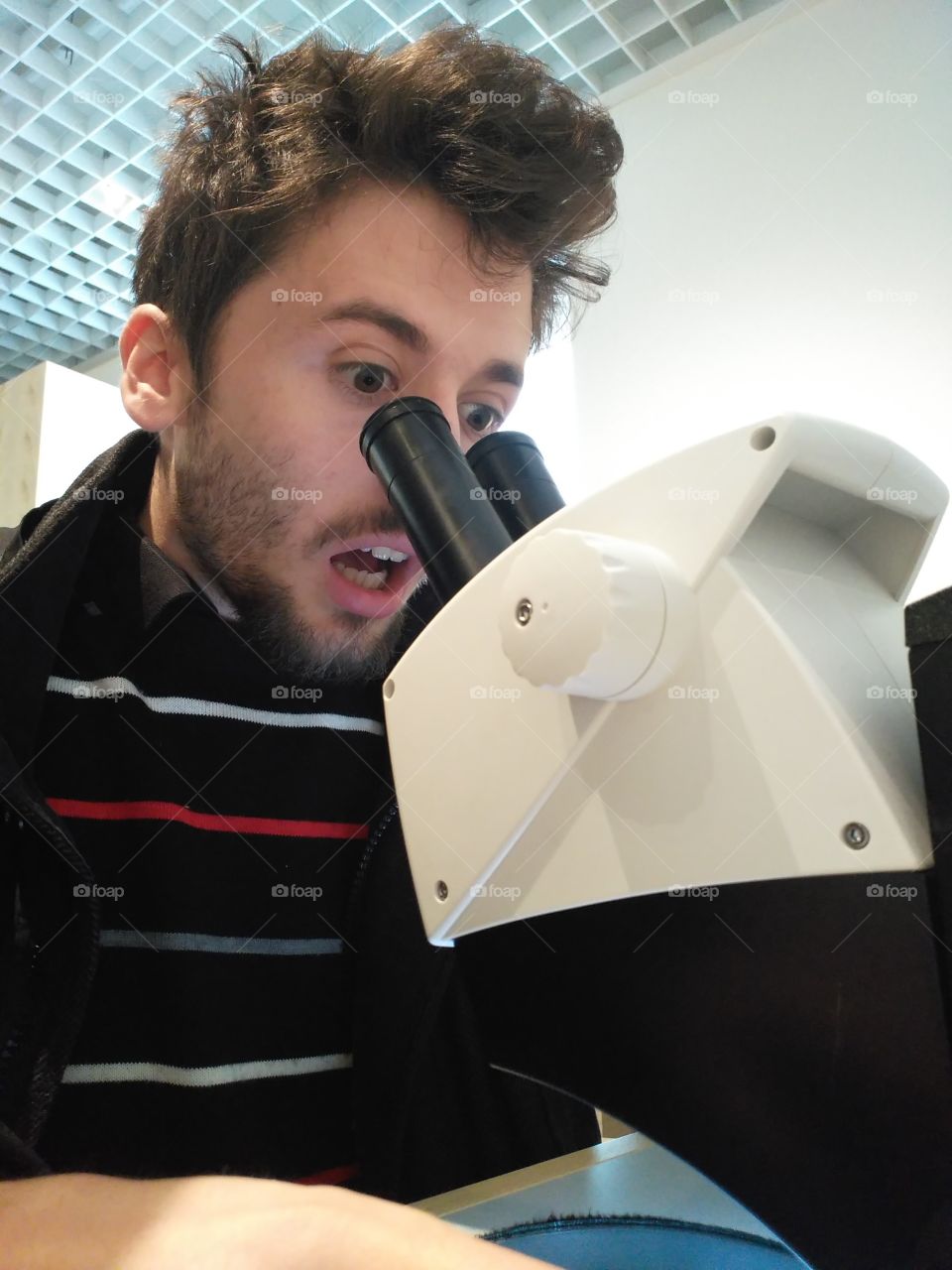looking into microscope surprise finding
