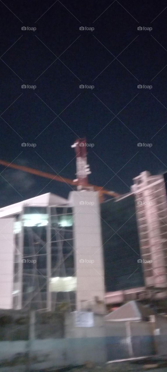 Amazing view of beautiful tall office building.Well lit at night. it's breathtaking.