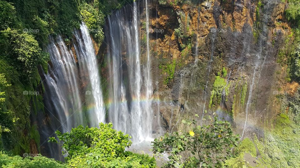 rainbow in tumpak sewu waterfall