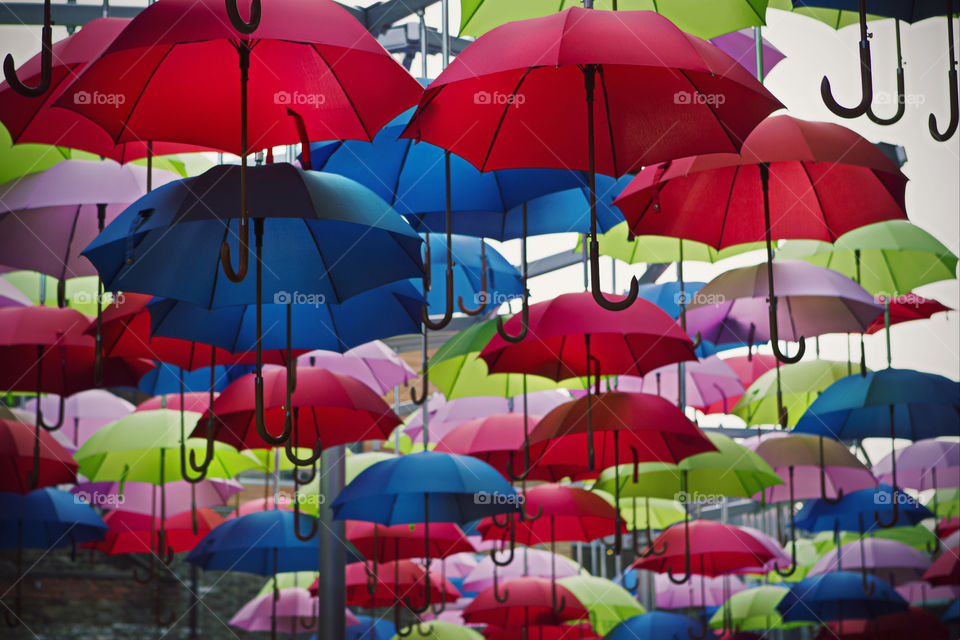Hanging multicolored umbrellas