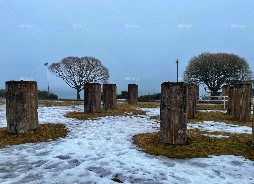 Odd concrete rectangles in front of the sea. They stand there as memorials for an old factory used to stand there, Kallahti, Finland