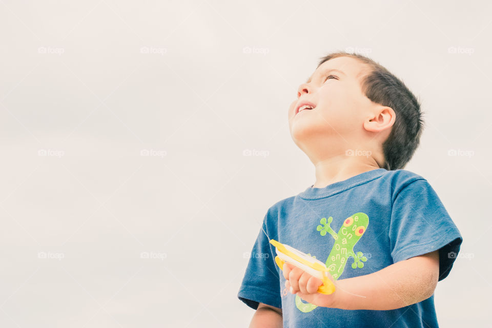 Boy flying a kite