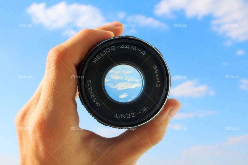 look at the sky through a lens