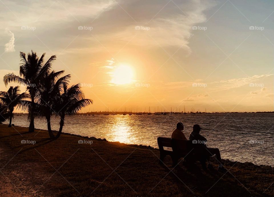 TWO FRIENDS AND SUNSET