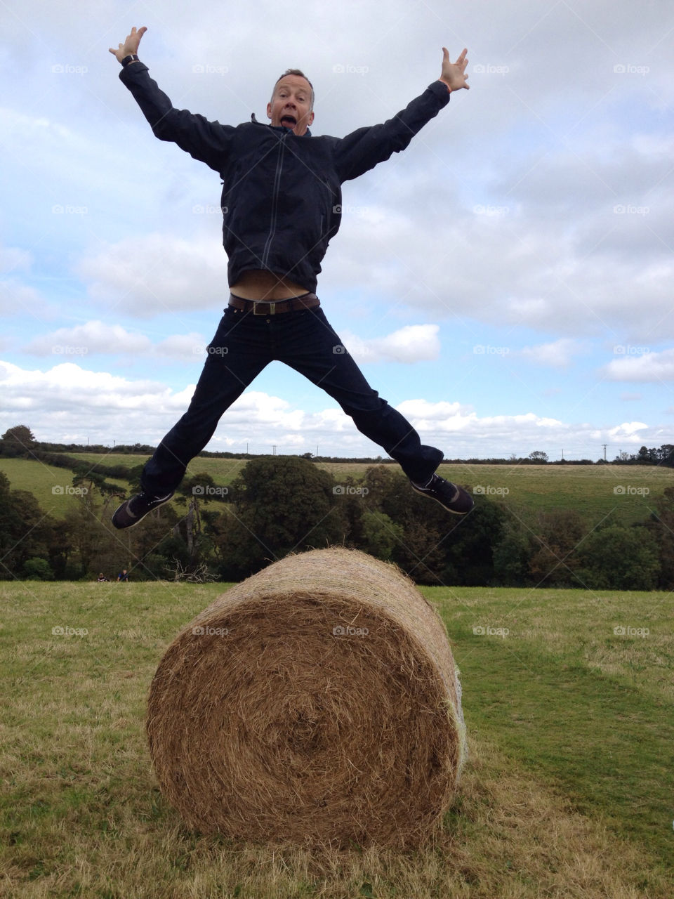 field fun man jumping by fatboytim