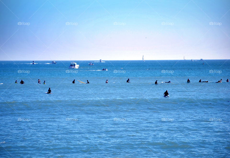 surfers waiting for the wave