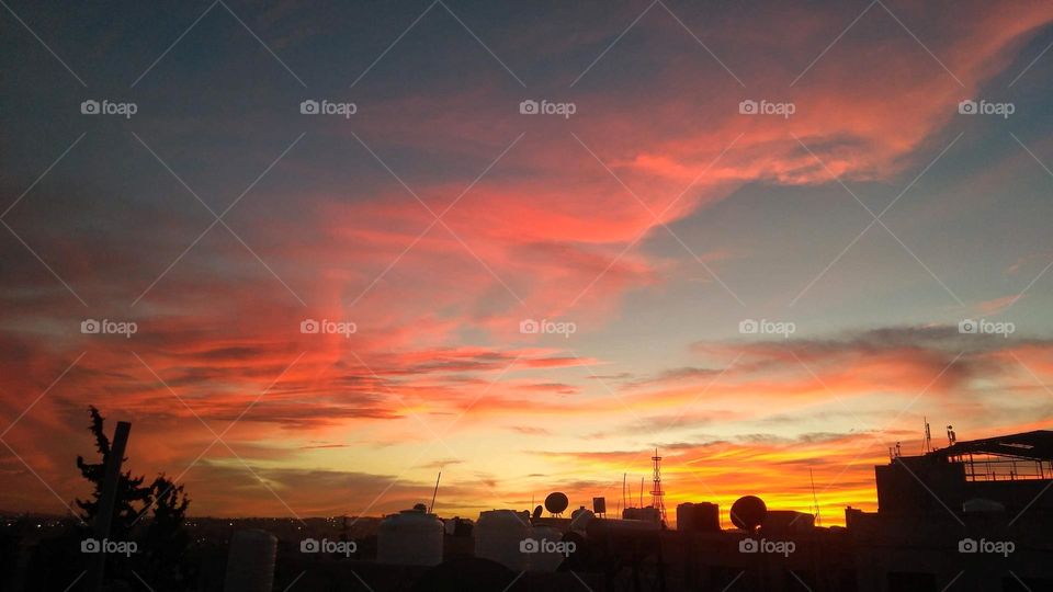 colorful clouds at dusk time
