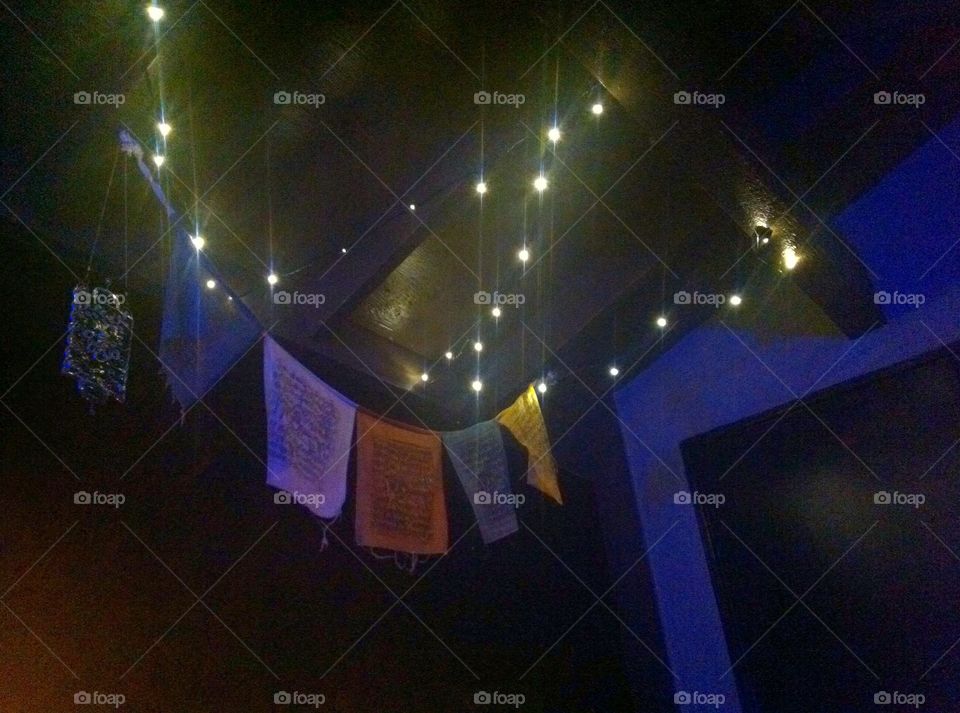 Zen Lights. Prayer flags and twinkle lights after dark