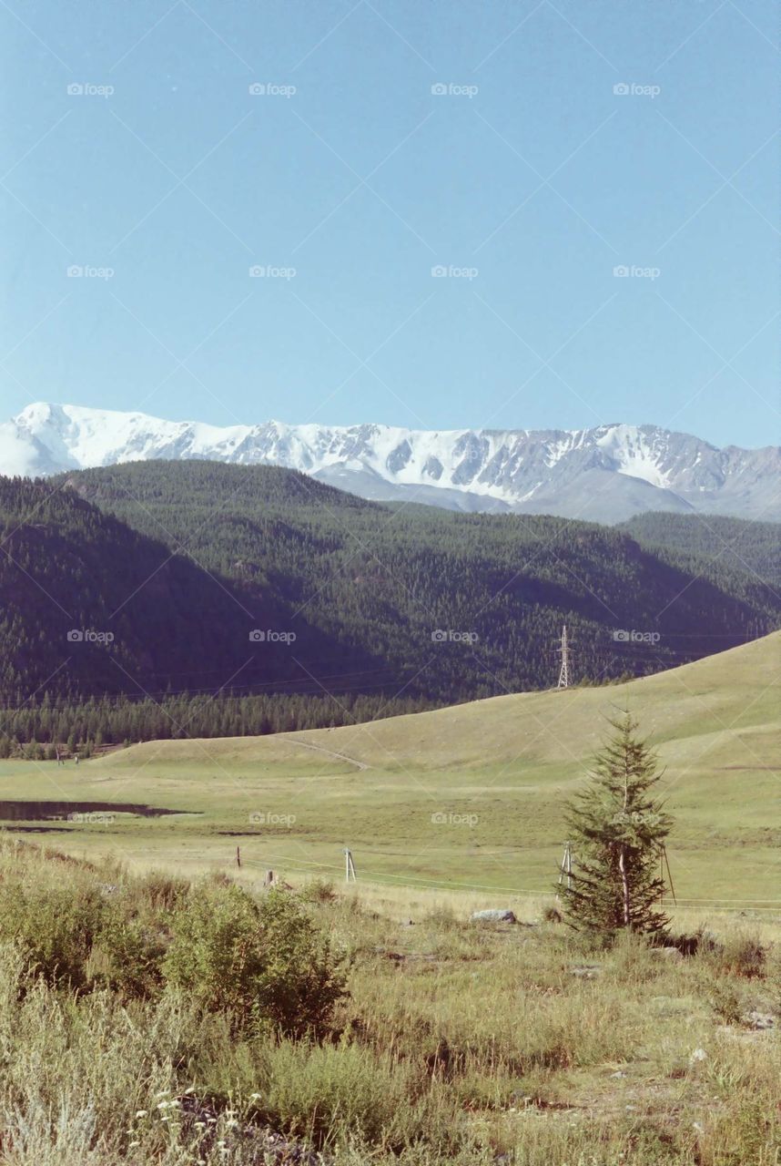 Mountains covered with snow. Shot on film 