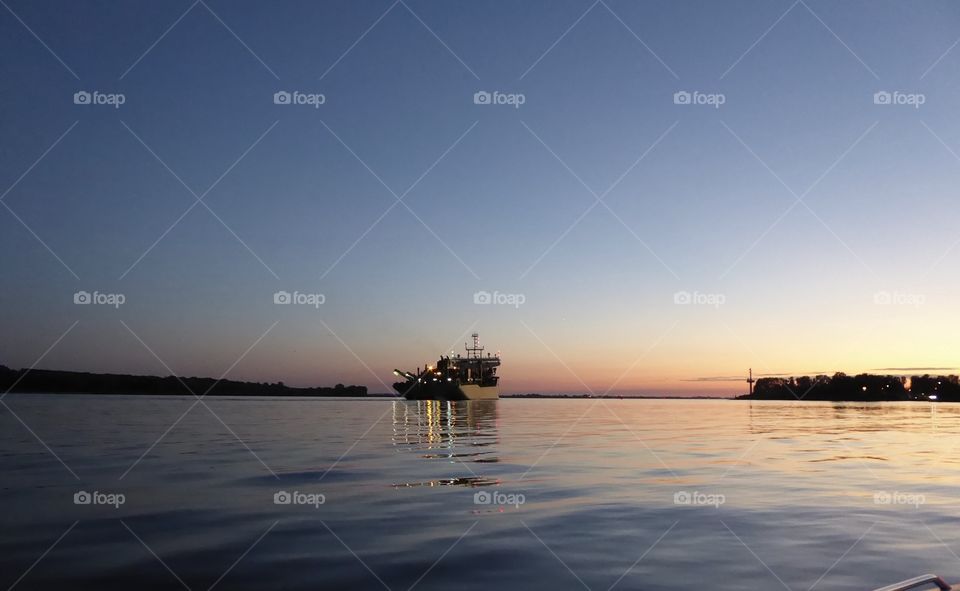 light reflection ship on the river 