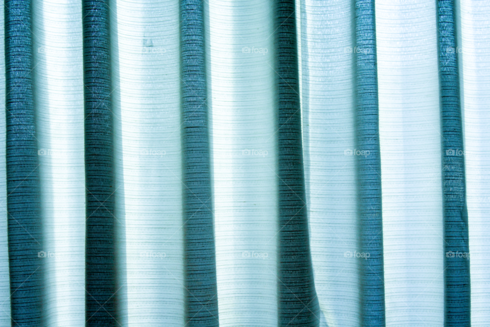 Full frame of blue curtain
