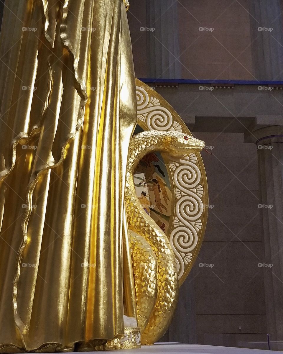 Sculpture of Athena close up of golden snake inside Parthenon in Nashville