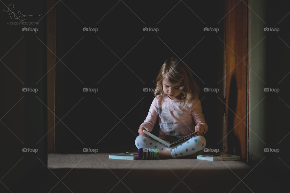 Girl reading books
