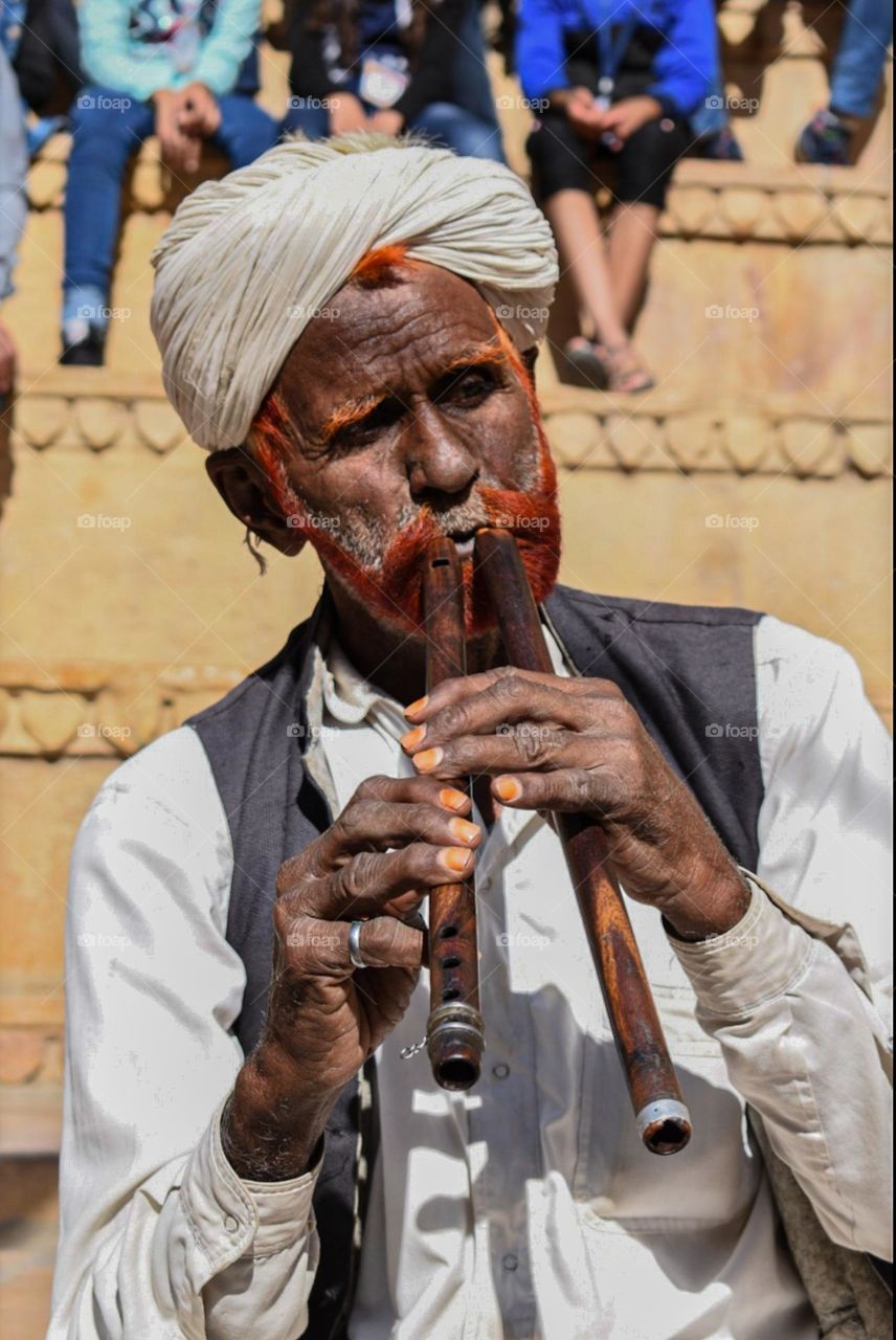 man playing a musical instrument