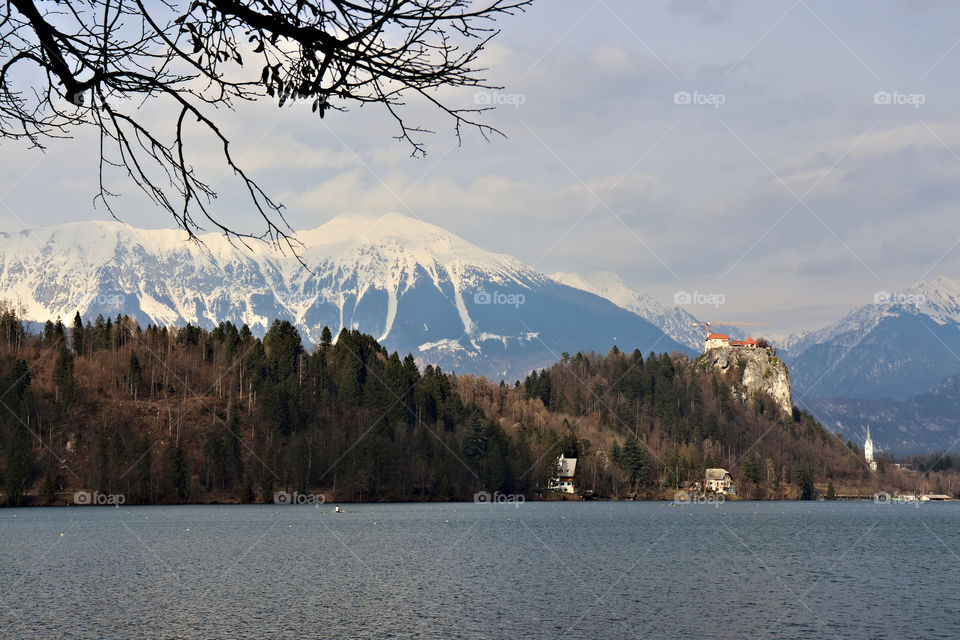 Bled castle with snow mountain