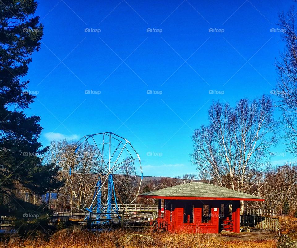 Ferris wheel at an abandoned amusement park.