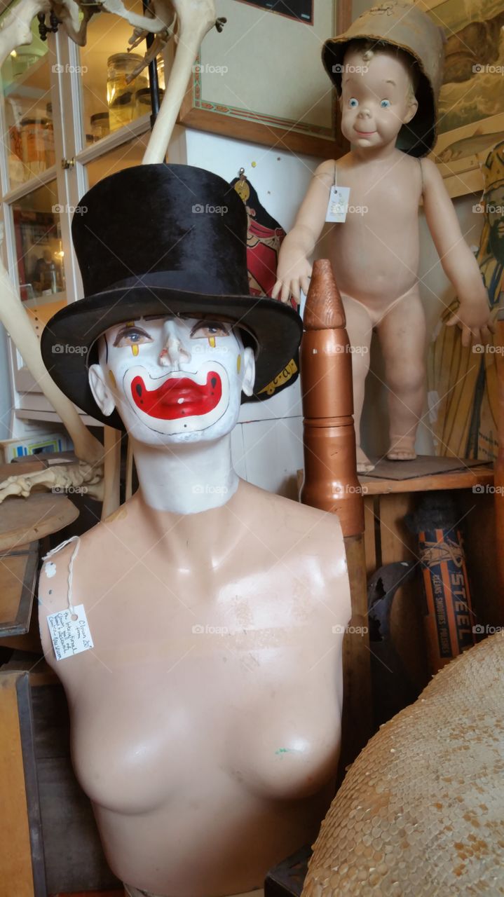 Creep Figures In Antique Thrift Store