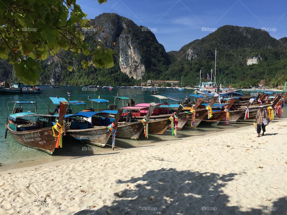 Thai longboats on Ko Phi Phi. The iconic Thai longboats on the shores of Ko Phi Phi island shot during my travels in SEAsia