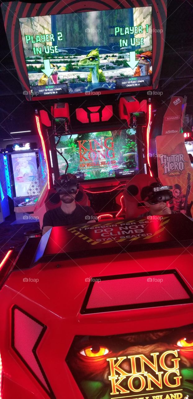 dad and son on VR game