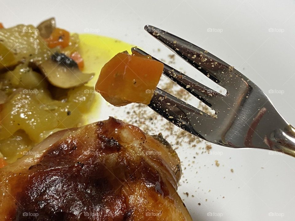 Plate with food and fork 