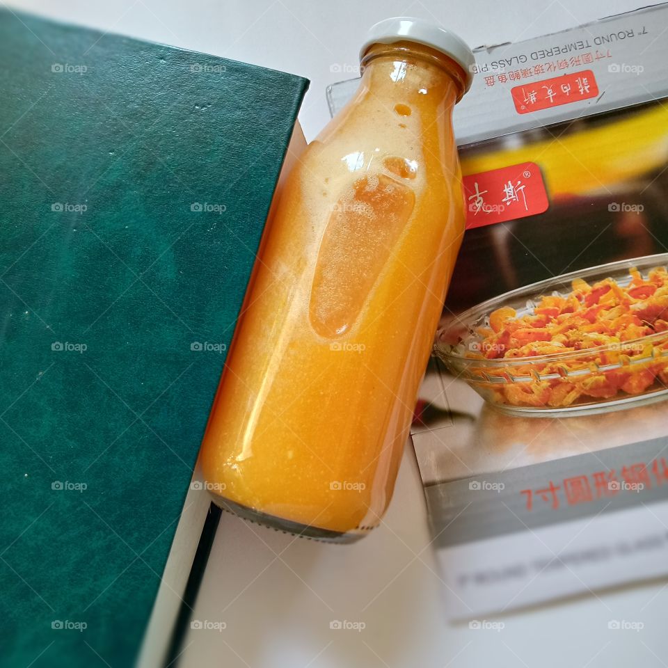 A bottle of bael fruit juice .