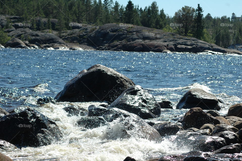 water stone sea sky