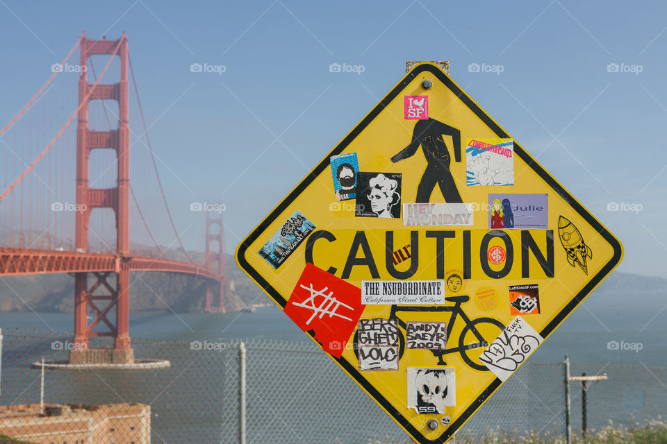 Yellow rectangle caution sign near the Golden Gate Bridge