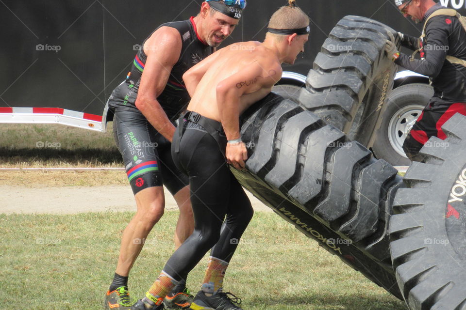 Tractor tire flipping