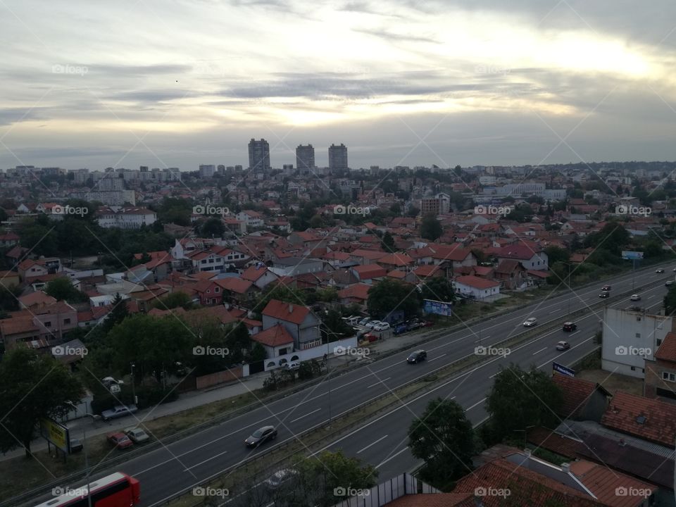 Sunset and three skyscrapers in distance