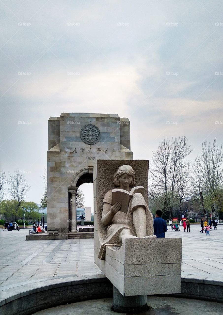 Tianjin University Peyhang Square. A beautiful girl reading book, but not in real. it's a statue.