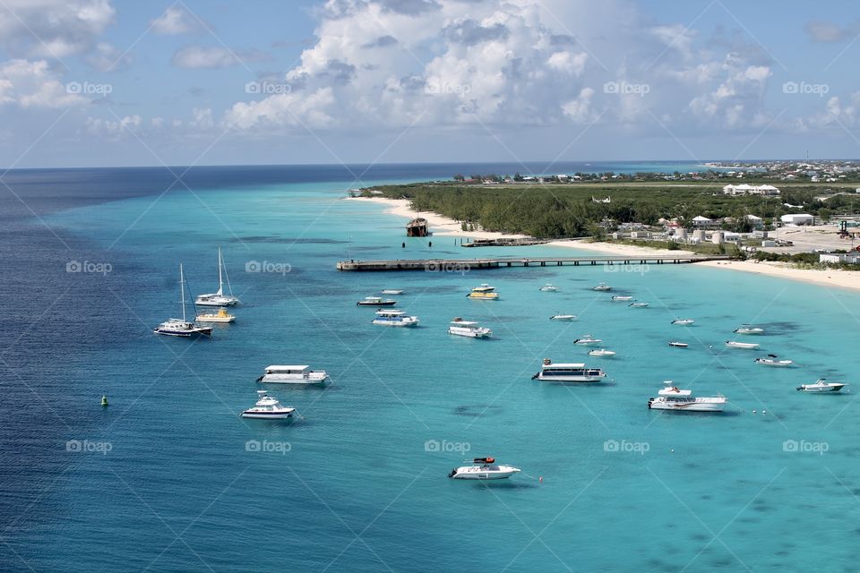 Fishing and sale boats on the beach tropical island view from above looking down