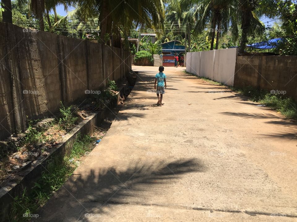 Walking the child, village 