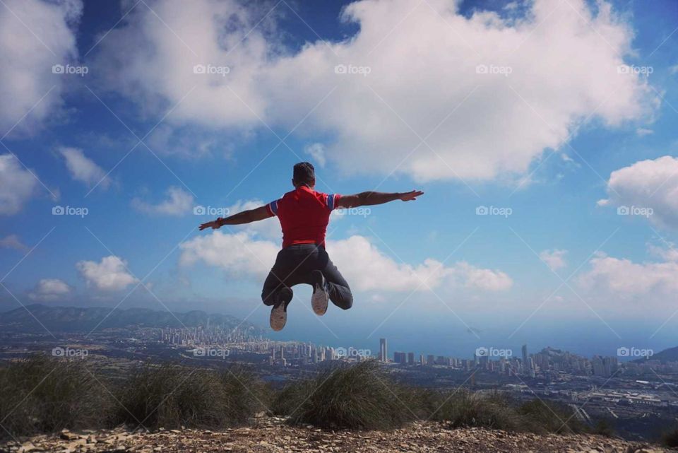 Clouds#human#jump#sky