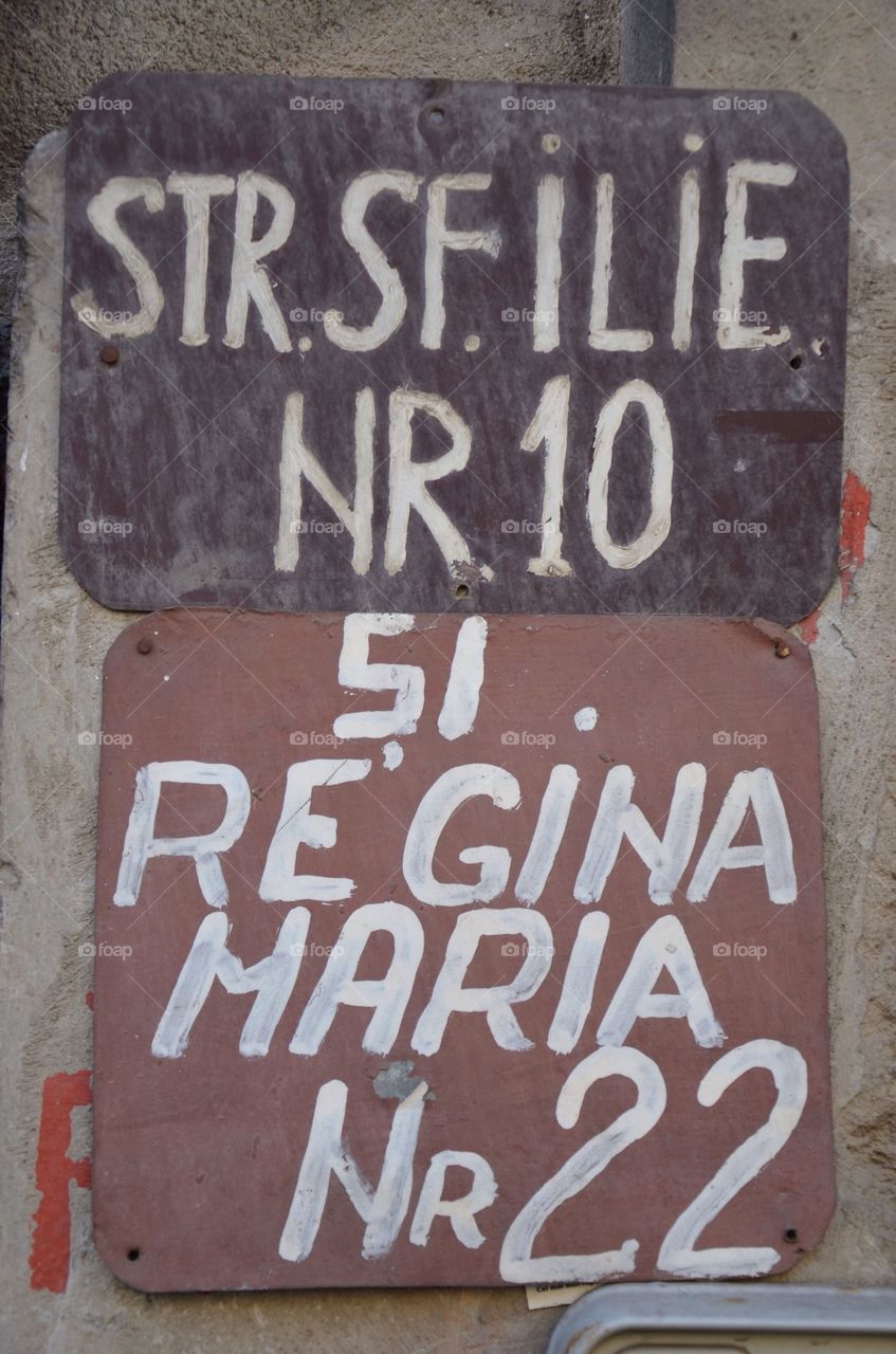 Two street signs in Bucharest, Romania