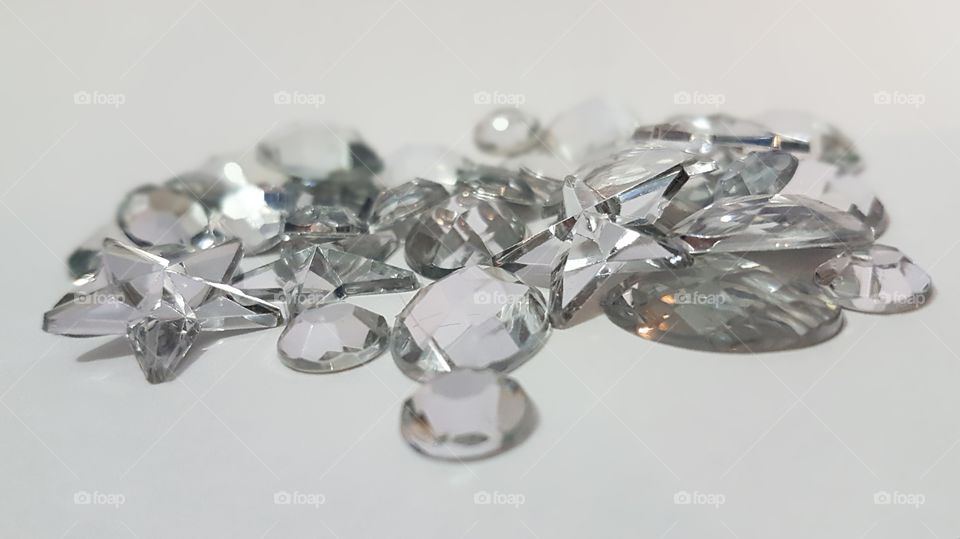 Crystal gem stones over white background