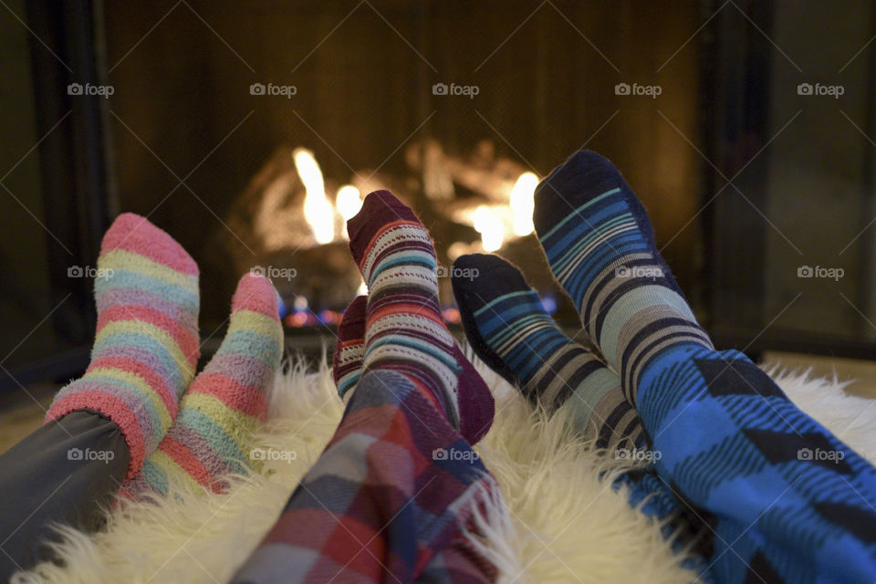 Pajamas and Socks in front of the fireplace 