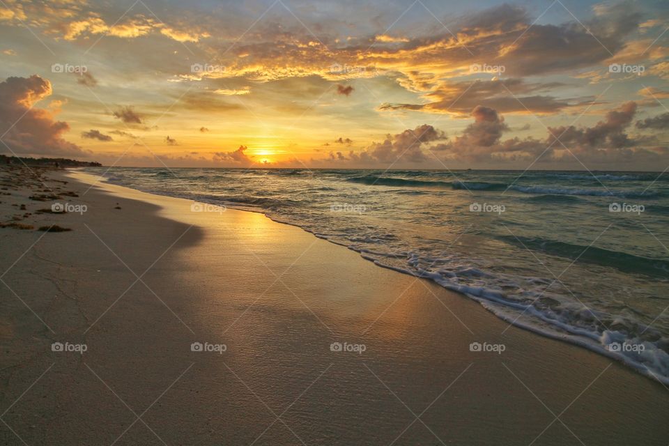 idilic sunrise in playa del carmen beach