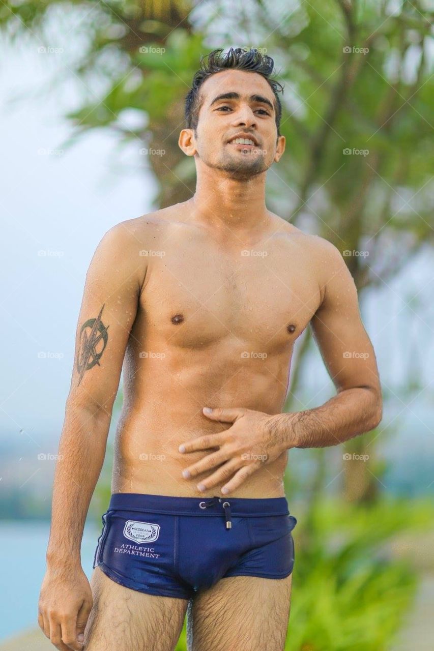 Indian model in pool. Indian Model in swimming trunks in Swimming Pool