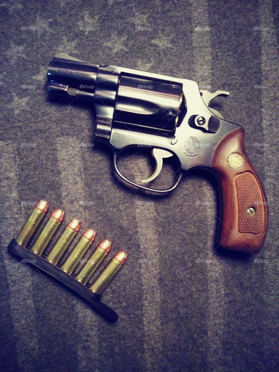 1971 Smith & Wesson - Chiefs Special Model 36 - 38 spl. Hornady hollow points. Bianchi speed strip. American flag.
