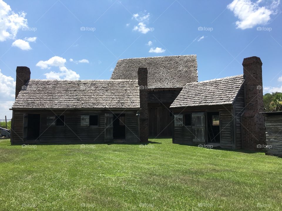 The Officer's quarters, Guard house, and Blockhouse at Fort King George.