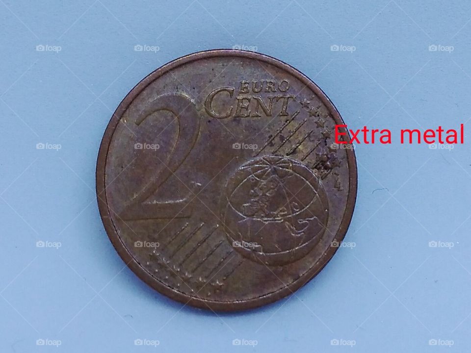 Rare 2 Euro cent error coin with extra metal