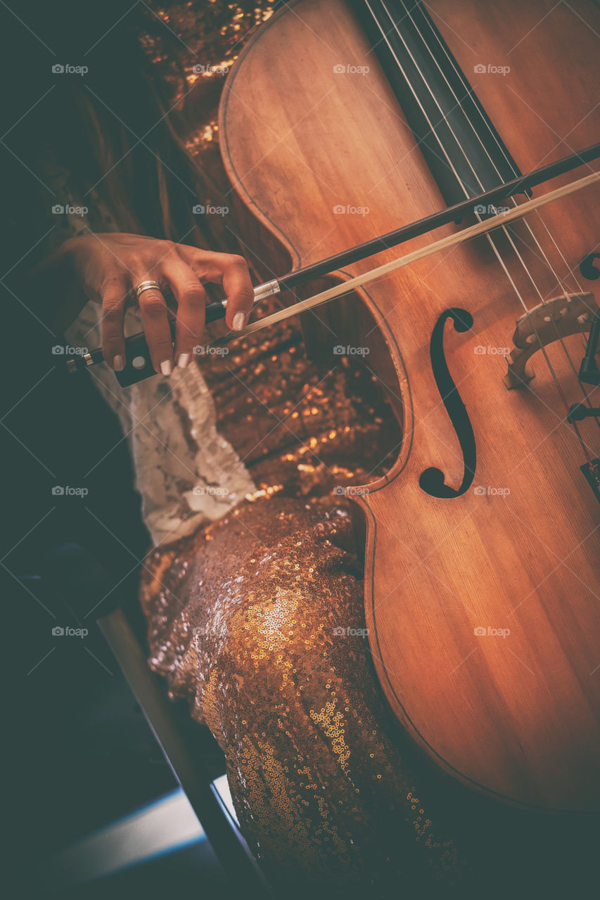 Playing cello, hands in frame