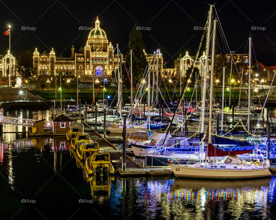 Downtown harbour in Victoria Canada lit up with lights