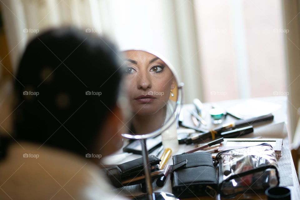 bride reflected in the mirror